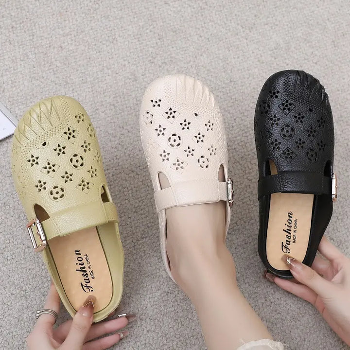 Three pairs of Azova textured synthetic mules in beige, khaki, and black, featuring a geometric embossed pattern, round toe with pleats, and adjustable gold buckle strap. One pair is shown worn on a foot.