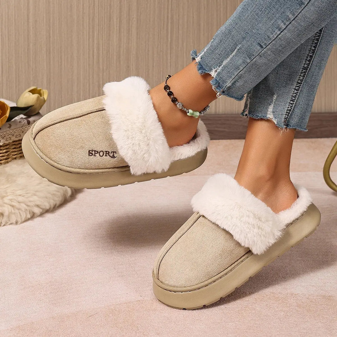 Beige mule slippers with plush white faux fur trim and embroidered &