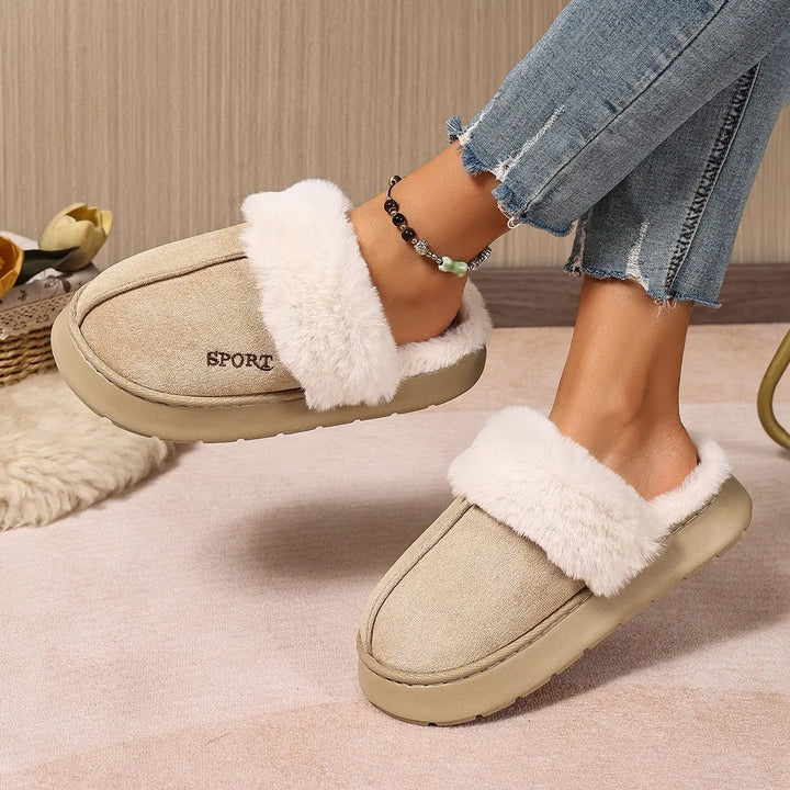 Beige mule slippers with plush white faux fur trim and embroidered &