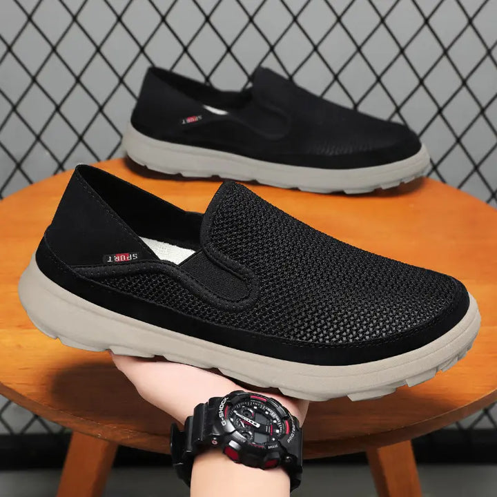 Three-quarter view of black breathable mesh men&