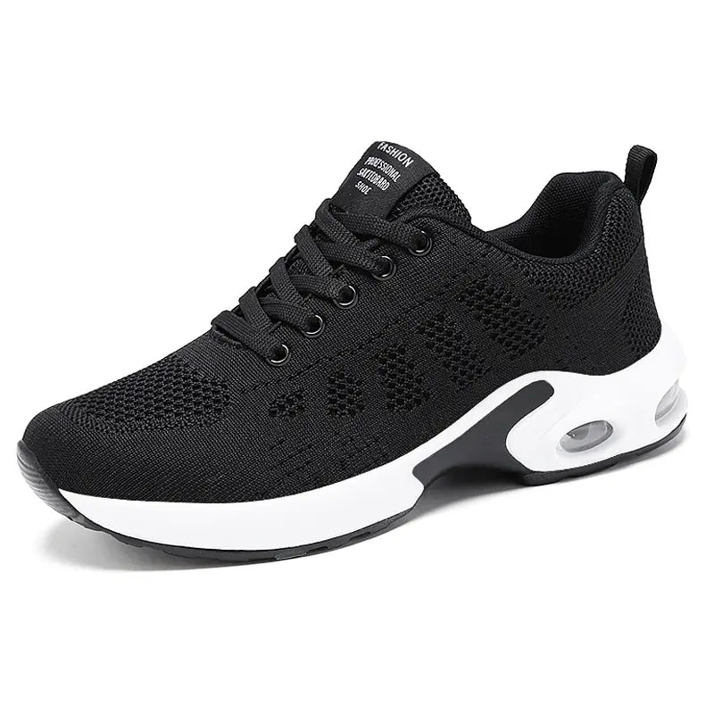 Black engineered mesh athletic sneaker with a white midsole and visible air cushion in the heel, featuring lace-up closure and a rounded toe, presented in a front view on a clean white background.