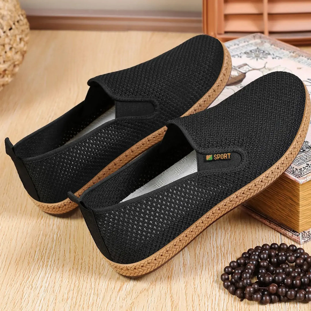 A pair of black breathable mesh men&