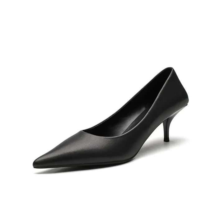 A black high-gloss faux leather stiletto heel shown from the side, featuring a sharply pointed toe and a slender heel.