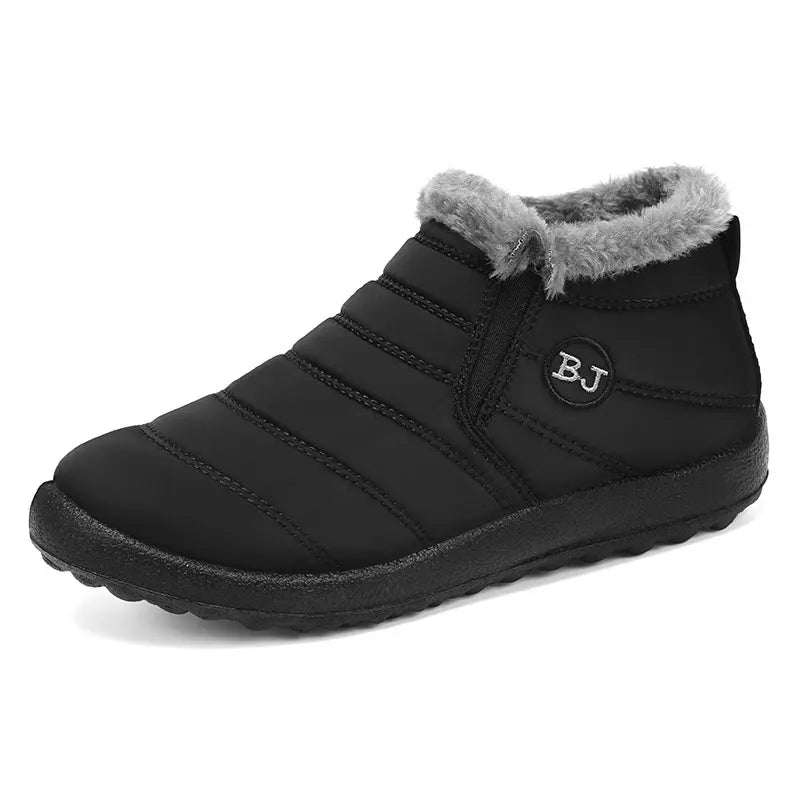 Black quilted nylon waterproof winter ankle boots with a light grey faux fur lining and &