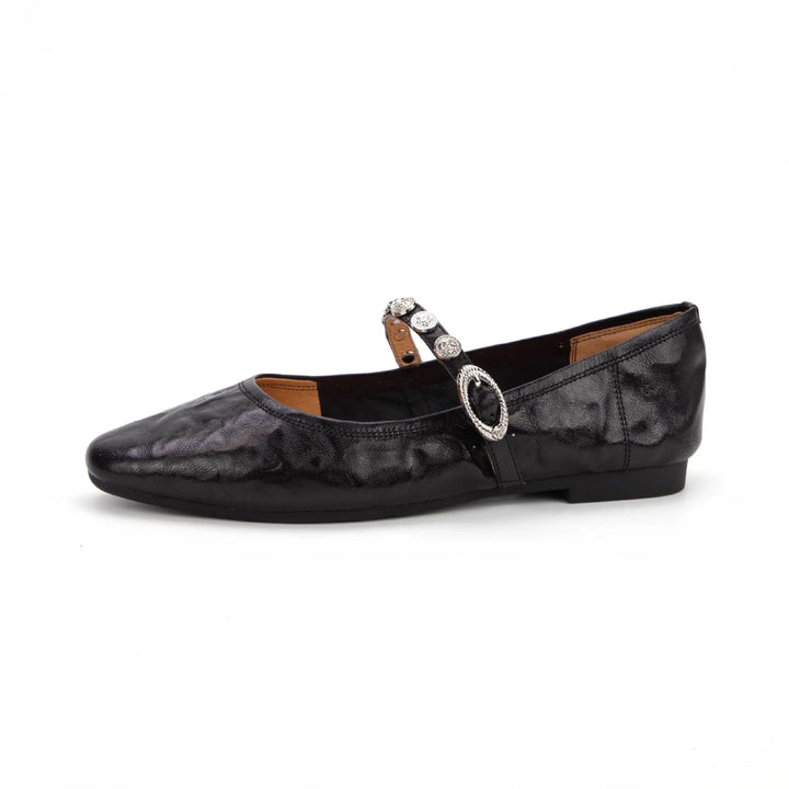 Black ruched lambskin leather Mary Jane flat shoe with a square toe, jeweled buckle strap, and flat sole, shown from a side angle.