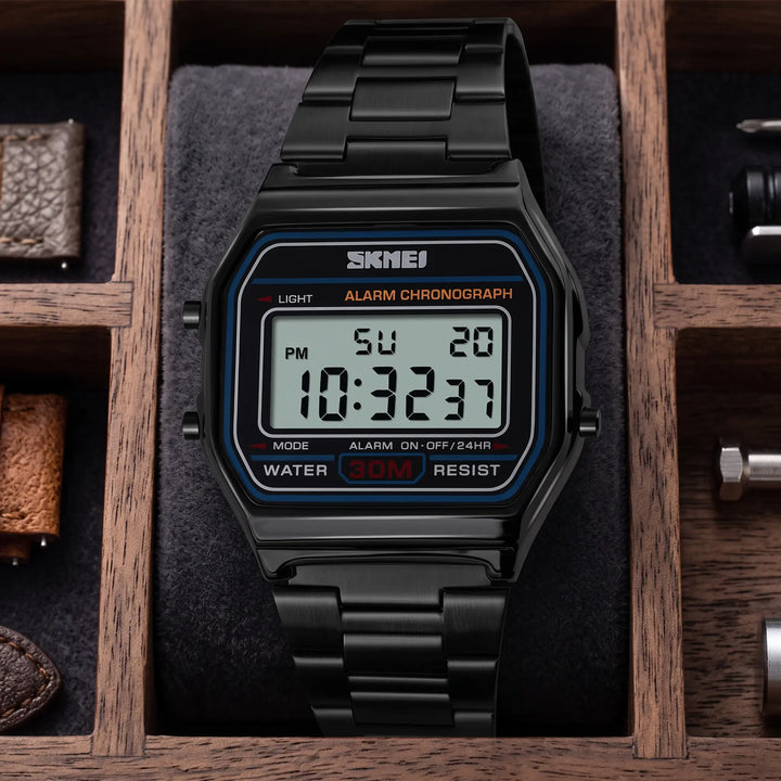 Front view of a black stainless steel retro digital watch featuring a blue luminous display, date, time, and functional buttons.