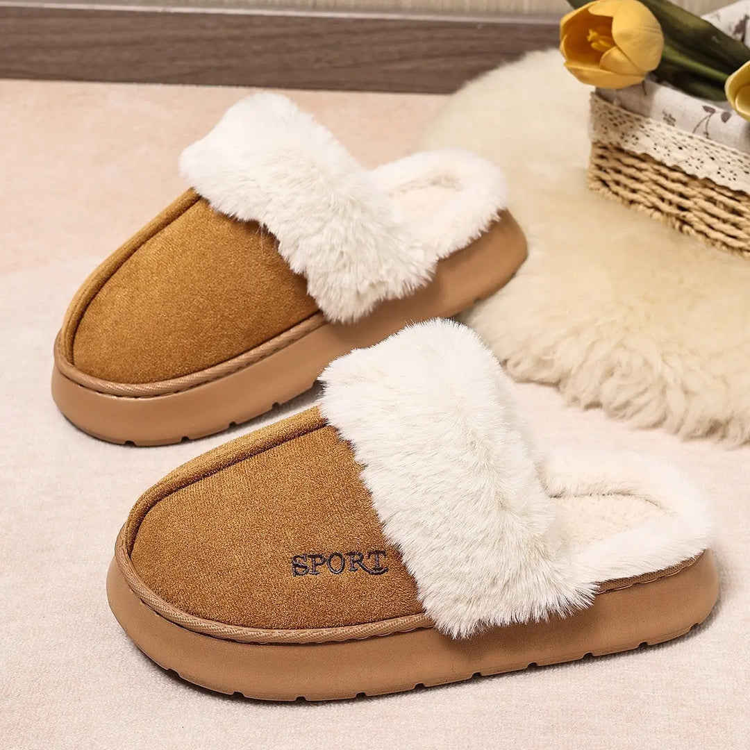 Brown mule slippers featuring a plush white faux fur trim, suede-effect upper, and an embroidered 'SPORT' logo on the vamp.