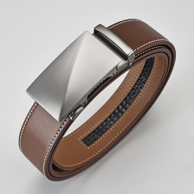 Brown genuine leather automatic belt coiled, featuring white contrast stitching and a brushed silver metal buckle with a ratchet mechanism.
