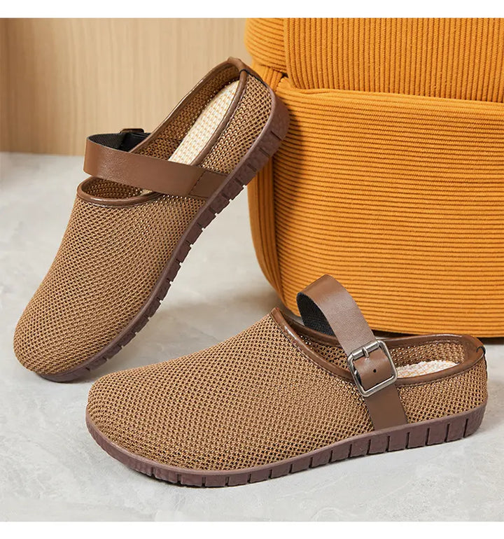 Side view of Earthy Brown breathable mesh slip-on loafers featuring a single adjustable buckle strap and a flat rubber sole.
