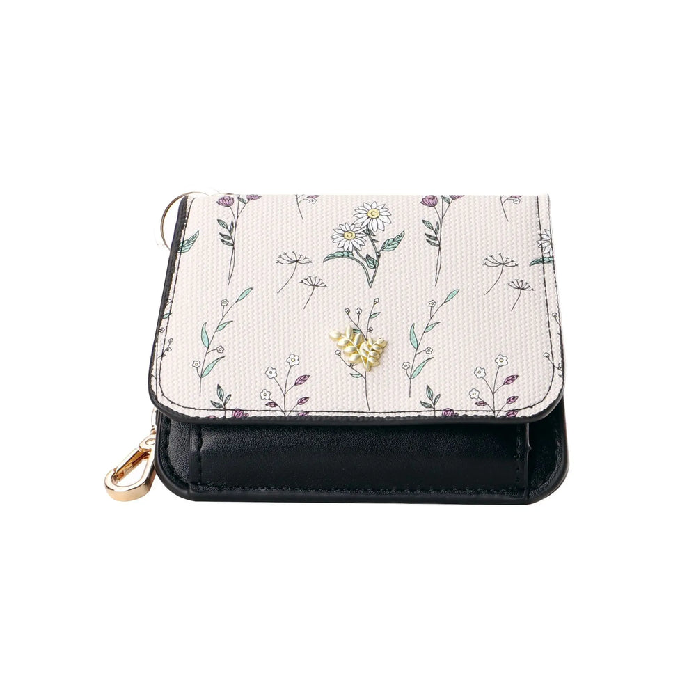 Compact tri-fold floral print PU leather wallet with gold hardware and integrated keychain, presented in a front view on a white background.