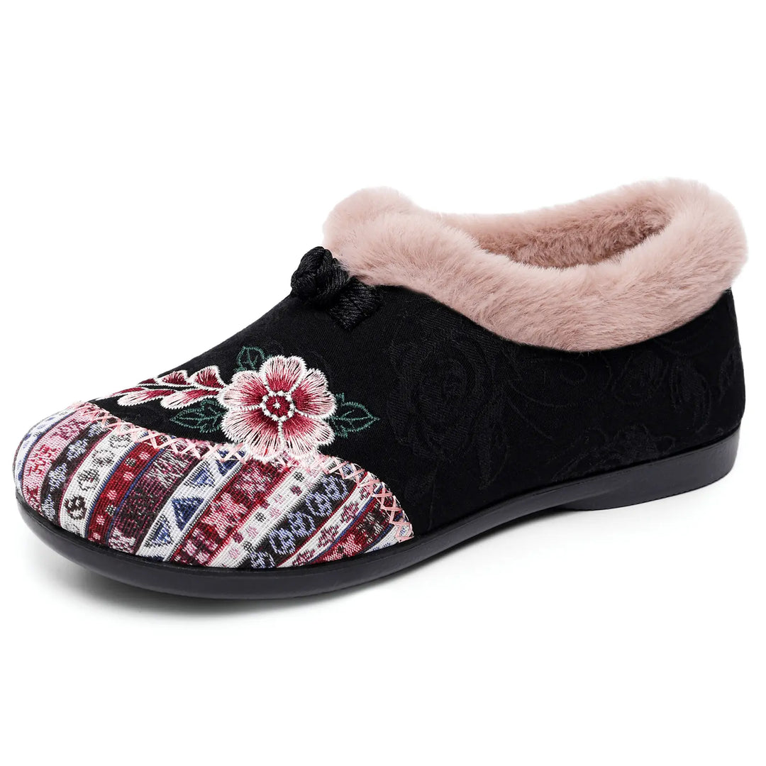 Charcoal grey embroidered mule slippers for women, featuring intricate floral designs, plush faux-fur lining, and a comfortable slip-on design.