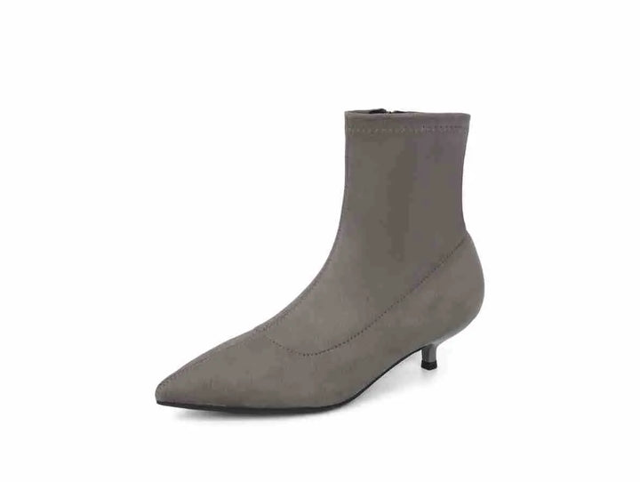Grey suede-like stiletto ankle boot with a pointed toe and inner side zipper, shown from the front.