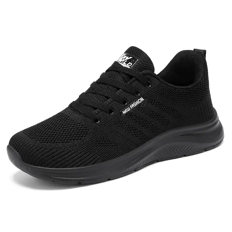 Black Kaelen breathable mesh trainers for men and women, featuring a lightweight EVA sole and a front three-quarter view for everyday comfort and running.