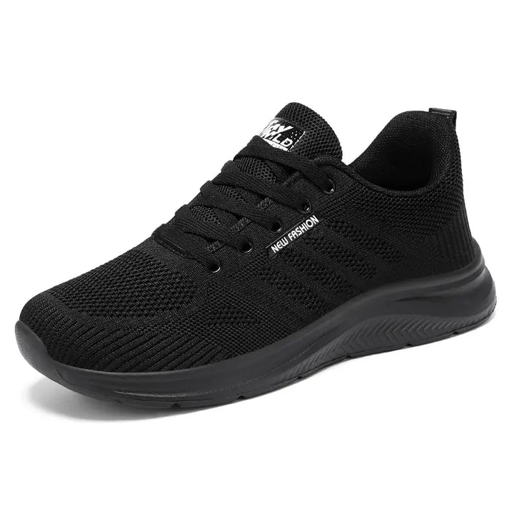 Black Kaelen breathable mesh trainers for men and women, featuring a lightweight EVA sole and a front three-quarter view for everyday comfort and running.