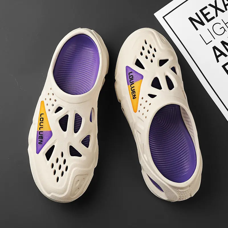 Creamy beige EVA clogs with purple insoles, featuring cut-out geometric designs and split orange/blue &