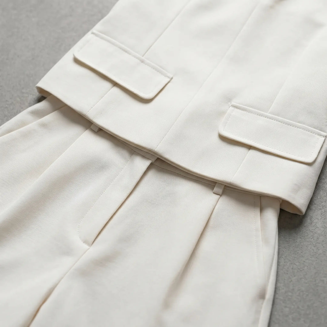 Close-up view of a Kaelen ecru linen-blend sleeveless V-neck top and tailored shorts set, showcasing the fabric&