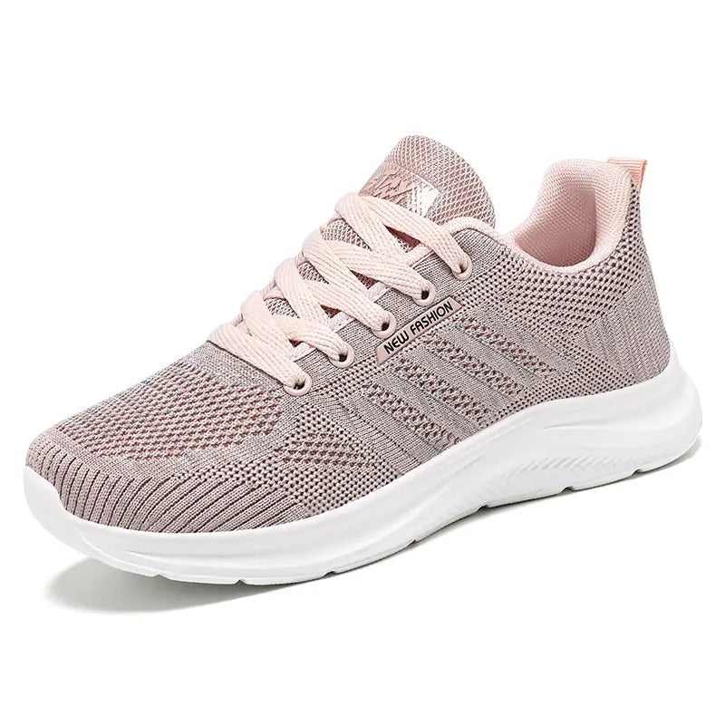 Pink Kaelen breathable mesh running trainers for women, showcasing a lightweight, modern design with a cushioned sole for exceptional everyday comfort and agile movement.