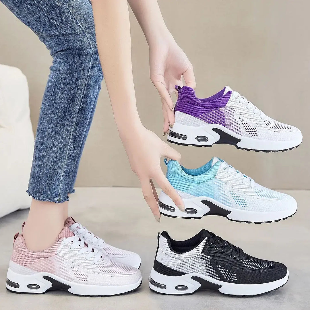 Kaelix breathable knit trainers displayed in multiple color options: purple, light blue, pink, and black/white, shown from a side angle with hands interacting.