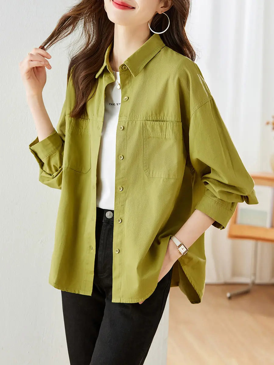 Women's Yuzu Green long-sleeved cotton shirt with a relaxed fit, featuring a polo collar, dual chest pockets, and tonal button-front closure.