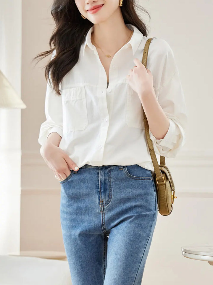 Model wearing a Kaelix Yuzu Green cotton shirt with a polo collar, dual chest pockets, and button-front closure, styled with blue jeans. A versatile, relaxed fit top for casual everyday wear.
