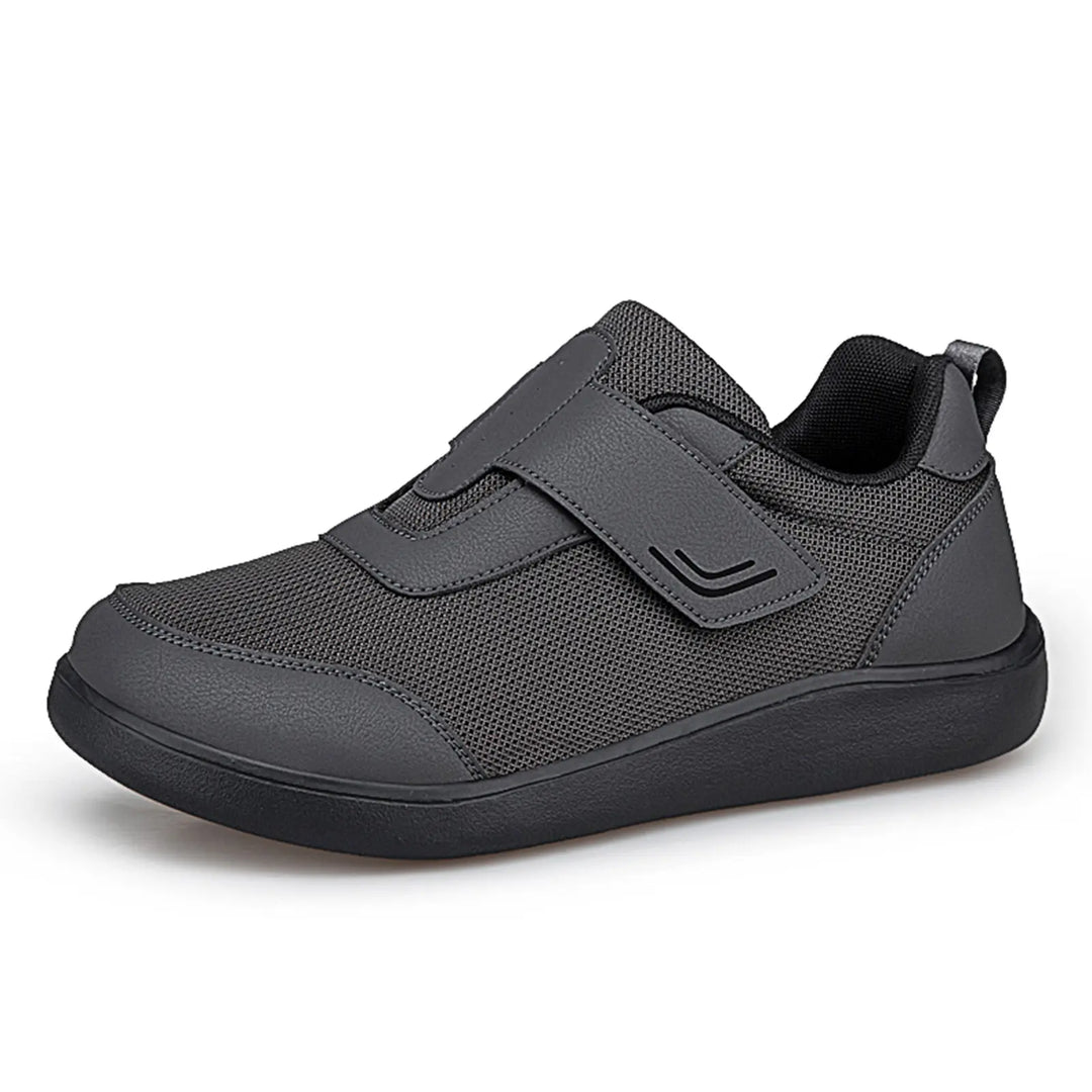 Three-quarter view of a Kaelo deep purple and black breathable mesh walking shoe featuring dual hook-and-loop straps and a supportive black EVA sole.