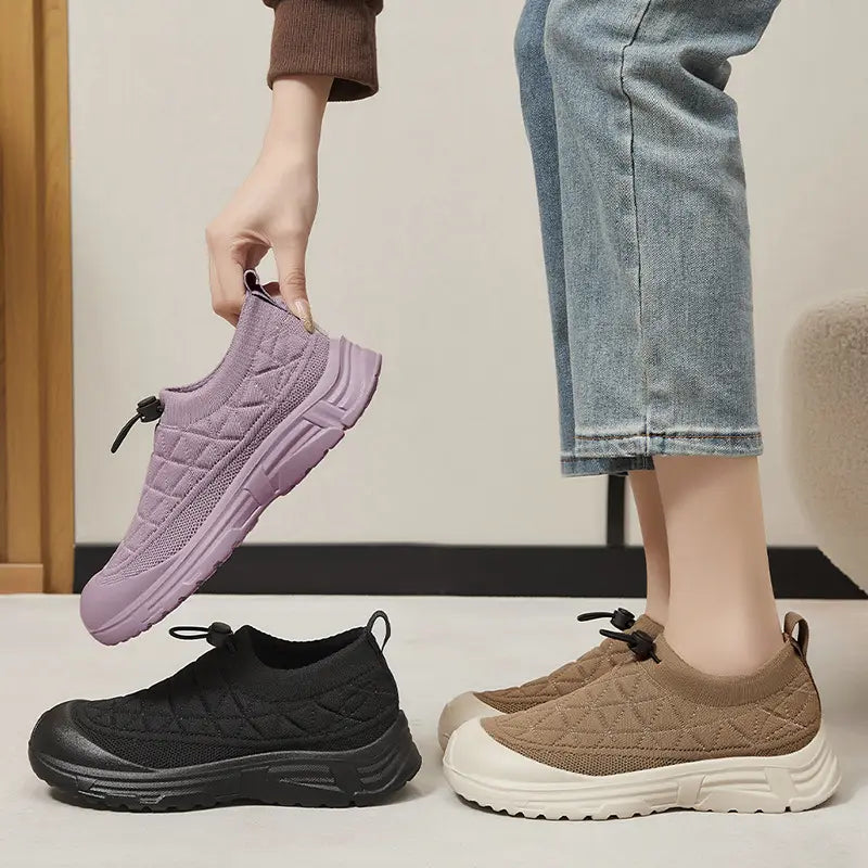 Showcasing three Kaelos women's breathable mesh slip-on sneakers in lilac, black, and taupe, featuring a quilted knit upper, bungee laces, and platform sole.