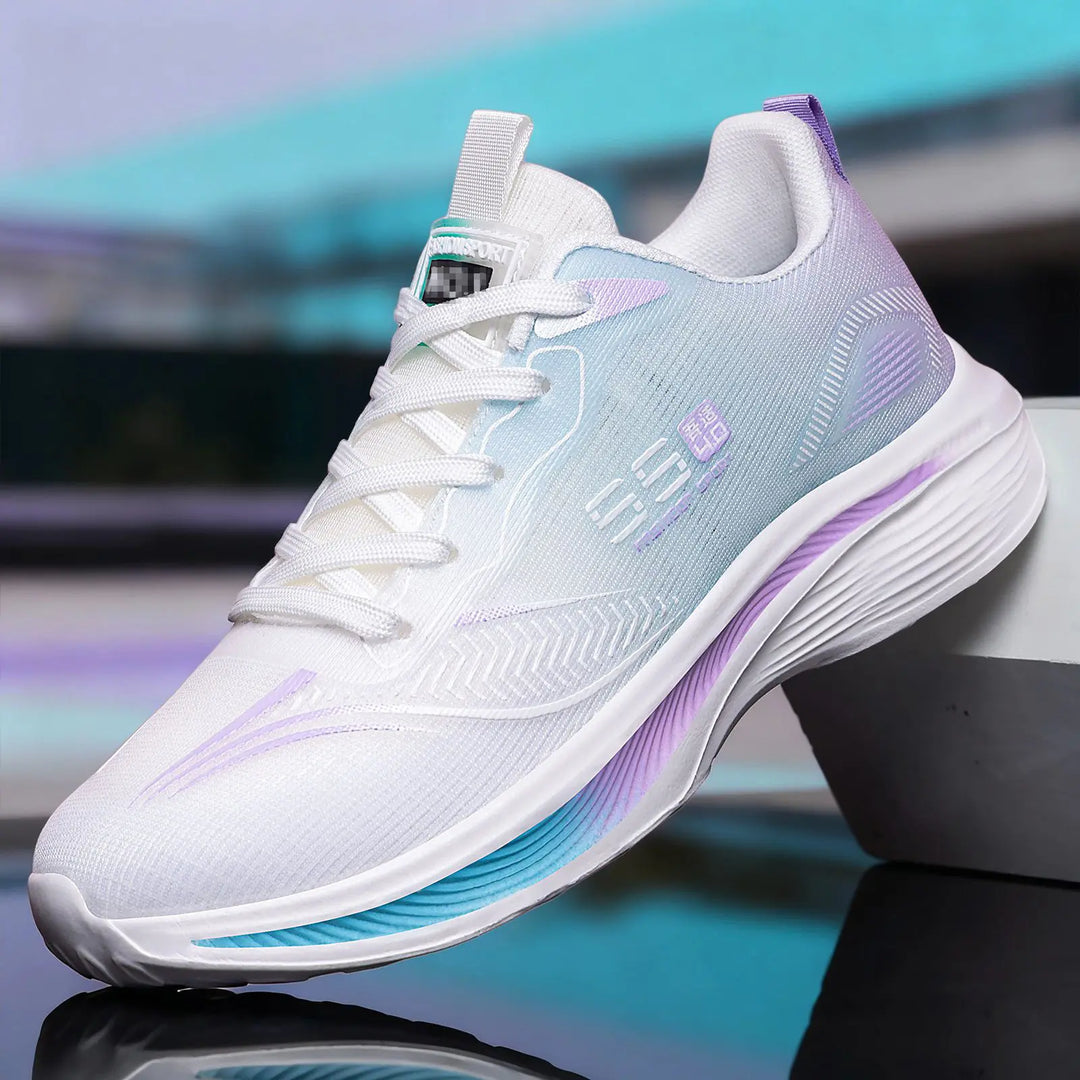 White Kaelos lightweight mesh sneakers with a lilac-blue gradient on the heel and midsole, featuring a sculpted wave sole and subtle graphic print.
