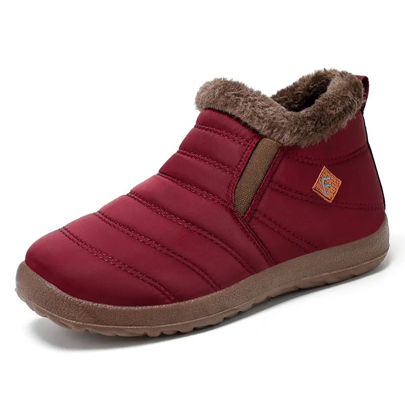 Kaelum deep red quilted winter boots with plush faux fur lining and elasticated side gussets, presented from a front view on a white background.
