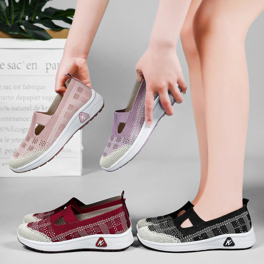 A collection of Kaelum women's breathable mesh slip-on sneakers in lilac, pink, burgundy, and black, showcasing geometric patterns and keyhole instep cut-outs.