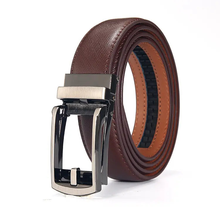 Korvan men's automatic leather belt in rich coffee brown, featuring a gunmetal automatic ratchet buckle and a contrasting tan leather lining, coiled on a white background.