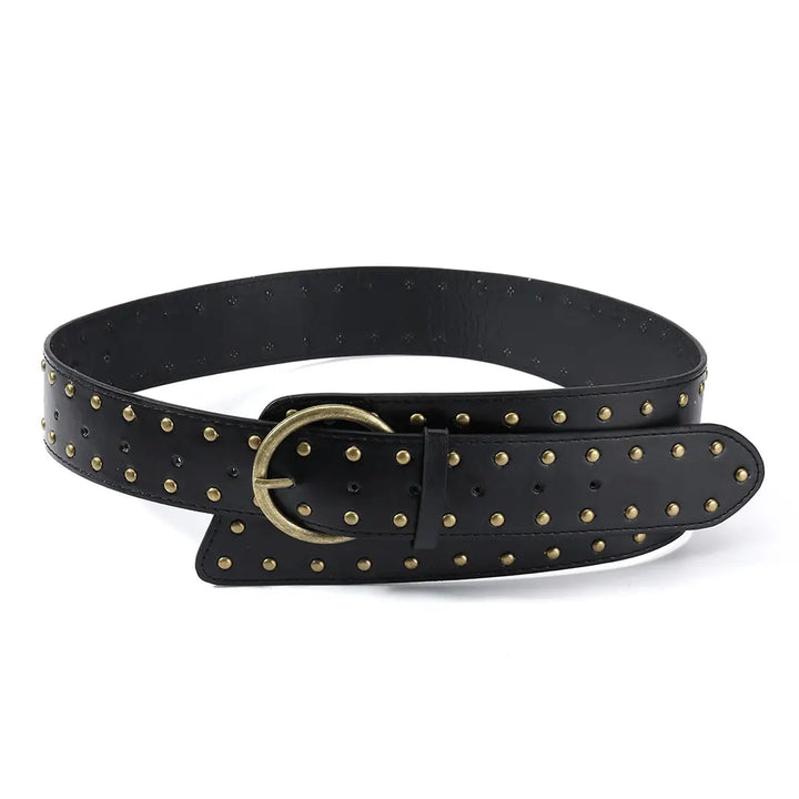 Wide black PU leather studded belt with antique brass pin buckle and keeper loop, displayed flat against a white background.