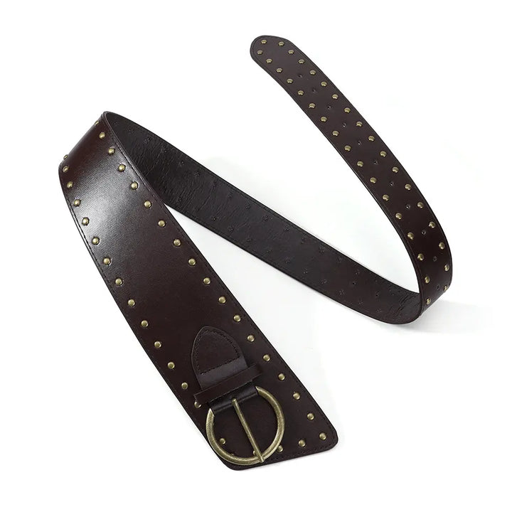 Wide black punk-inspired leather belt adorned with uniform antique brass studs and a D-ring pin buckle.