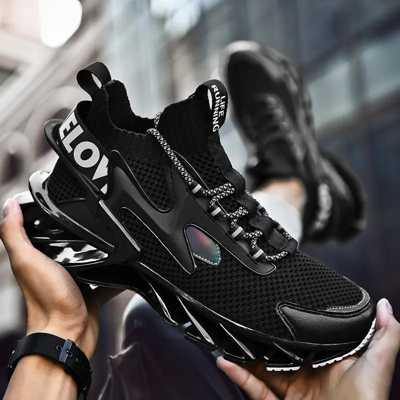 Black men's Kylos lightweight breathable running shoes shown in a three-quarter view, held by hands with a blurred cityscape background. Features an aggressive sculpted sole and mesh upper.