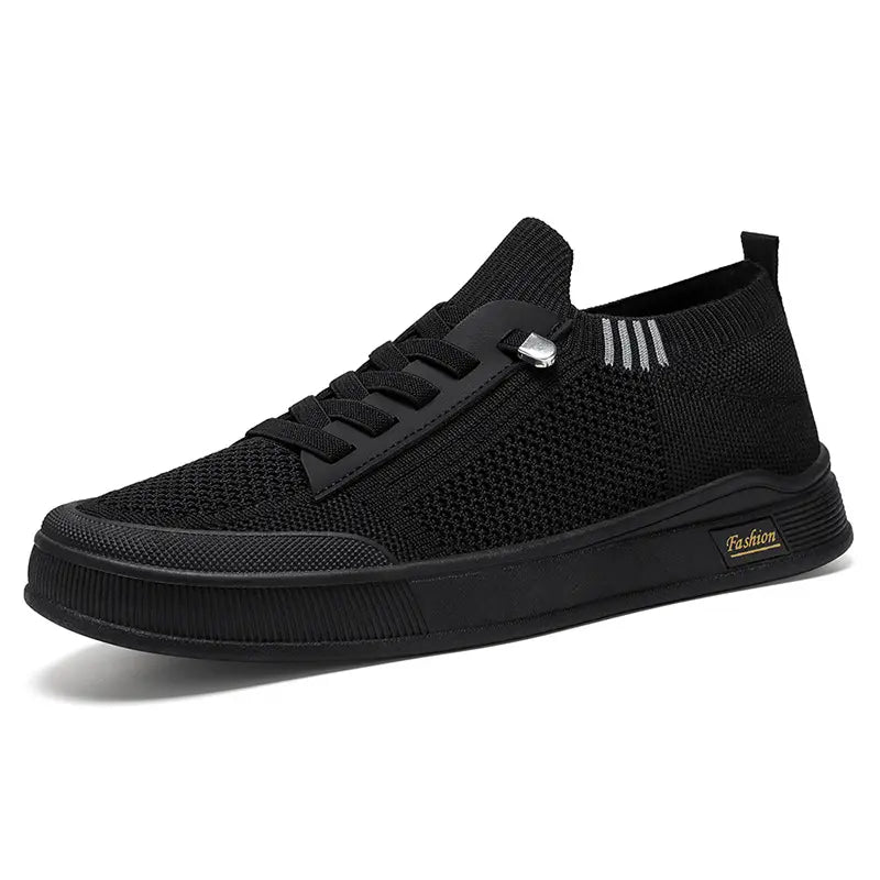 Men's black breathable mesh Kyzir casual sneakers shown in a three-quarter front view on a white background, featuring a slip-on design with flat laces and a white rubber sole.