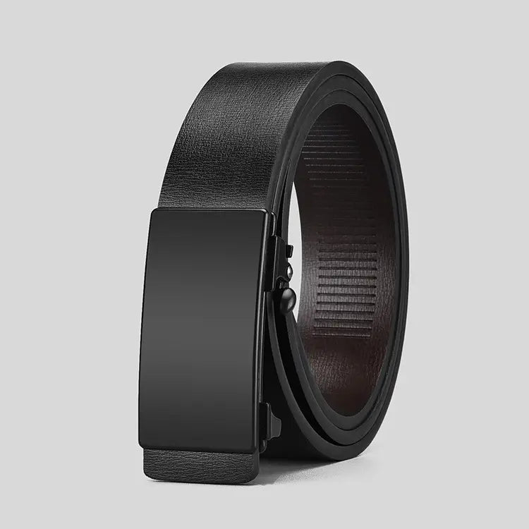 Men's black leather automatic belt with an all-matte black rectangular buckle, featuring a smooth exterior and ribbed dark brown inner lining, displayed in a studio setting.