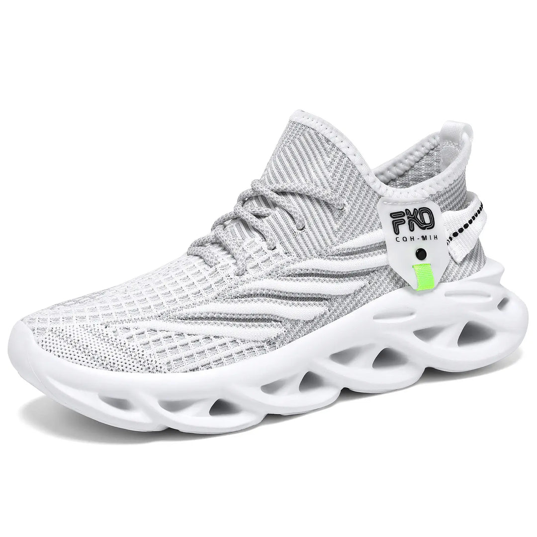 Mikari modern casual trainers featuring a breathable beige and grey engineered knit upper with a sculpted light tan sole and a bright lime green accent tag.