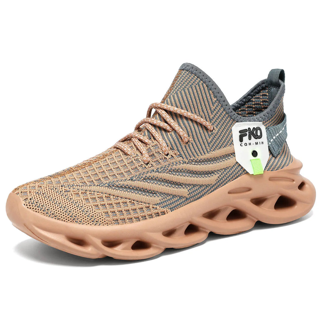 Mikari high-top breathable knit sneakers in warm beige and grey, featuring a sculpted light tan sole, lace-up closure, and a small lime green tag detail. Presented from a three-quarter view on a white background.