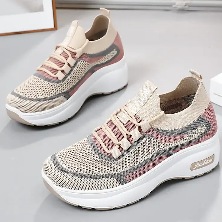 Chunky platform trainers for women in blush pink knit with a striped pattern, featuring grey laces and a white sole with &