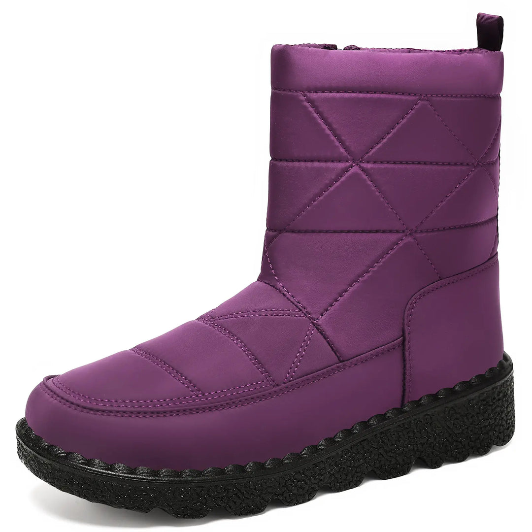 Purple quilted mid-calf winter boots with faux fur collar trim, adjustable strap, and a chunky lugged rubber sole.