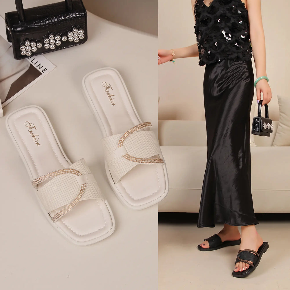 Pair of white Qyrell chic flat sandals with square toes and embellished straps, shown alongside a lifestyle image of black sandals worn by a model.