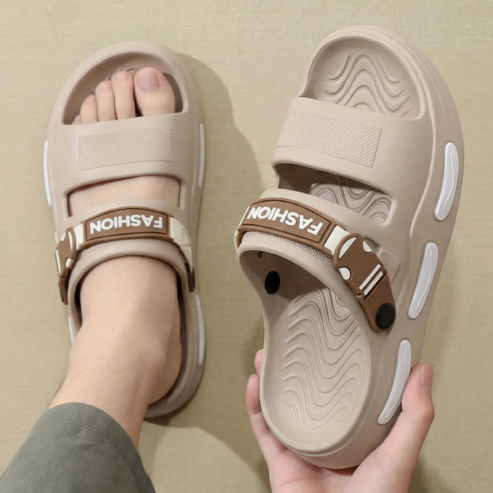 Beige Rhyza chunky platform slide sandals with dual adjustable straps featuring embossed &
