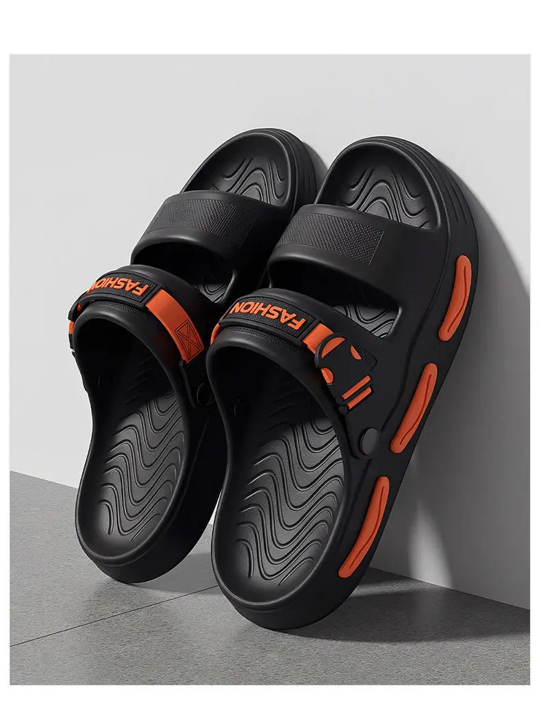 Rhyza black chunky EVA slide sandals with dual adjustable straps featuring orange &