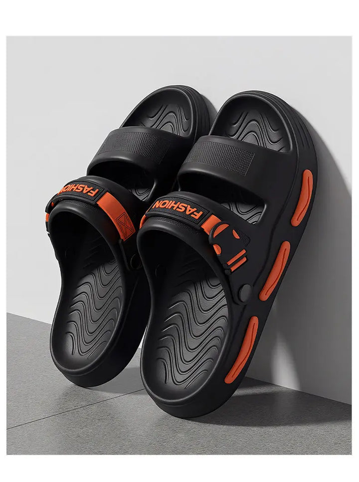 Rhyza black chunky EVA slide sandals with dual adjustable straps featuring orange &