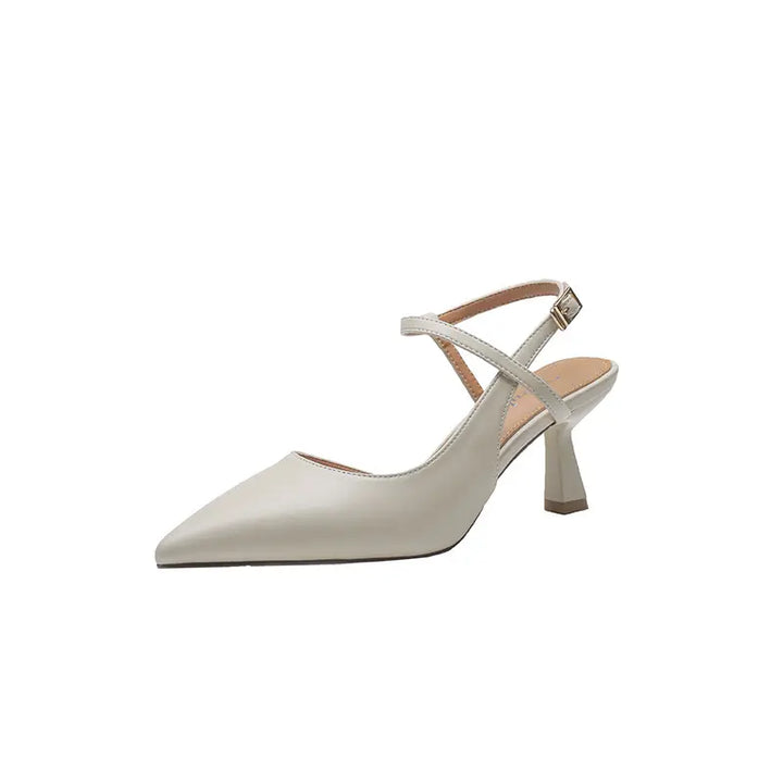 Rhyzon elegant ivory pointed-toe slingback heels with a sculptural flared mid-heel and adjustable thin ankle strap.