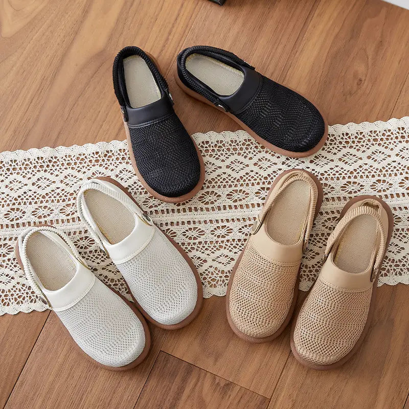 A flat-lay arrangement of Rovak breathable mesh slip-on mules in black, light grey, and beige, displayed on a wooden surface with a decorative lace runner.