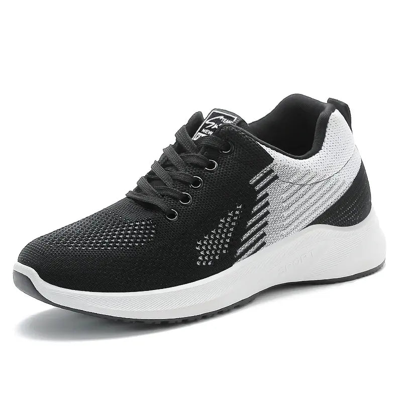 Black and white Rylux athletic knit sneakers shown from the front, featuring a breathable mesh upper, secure lace-up closure, and a lightweight white sole.