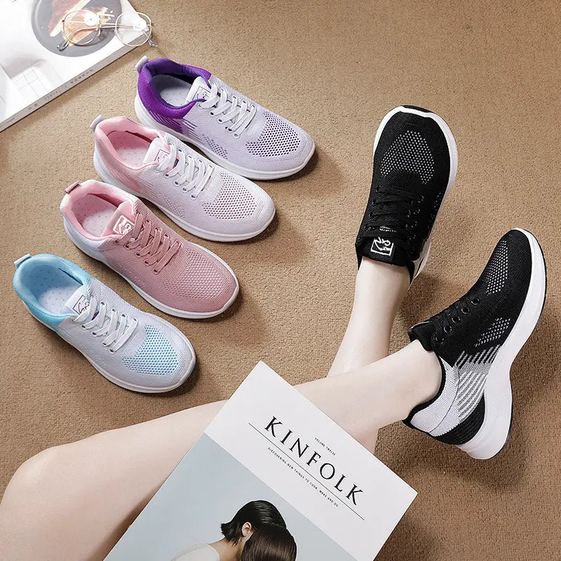 Lifestyle shot of Rylux breathable knit sneakers worn by a person, styled with other color variants arranged around. Features a chic, athleisure design.