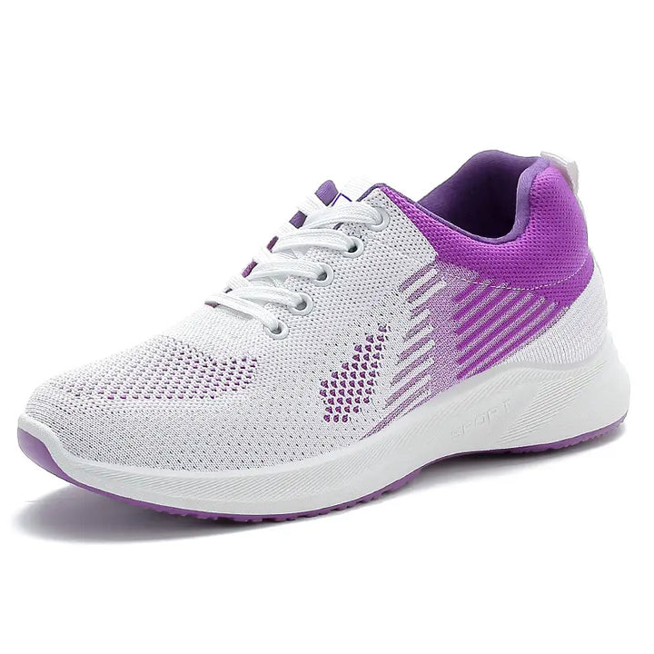 White Rylux breathable knit sneakers with vibrant purple accents, displayed from a front view on a clean white background, showcasing their lightweight and stylish athleisure design.