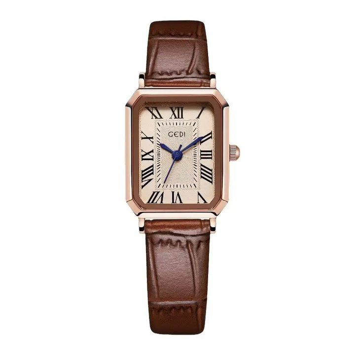 Rose gold rectangular watch with a cream Roman numeral dial, blue hands, and a brown embossed leather strap, presented on a white background.