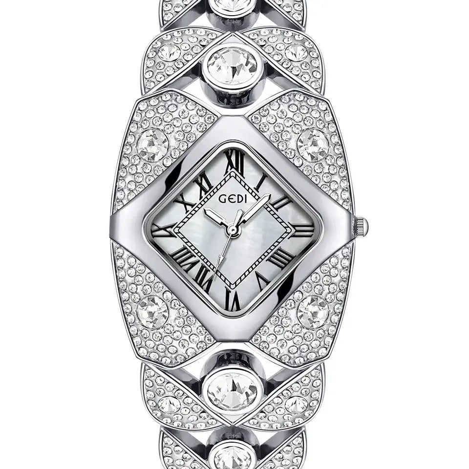 Silver-tone Tavril diamond-embellished bracelet watch with a rhombic dial and Roman numeral markers, showcased on a clean white background.